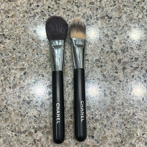 One Chanel blush brush and one Chanel foundation brush